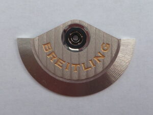 Close-up of the Breitling rotor of a Valjoux 7750 automatic chronograph movement