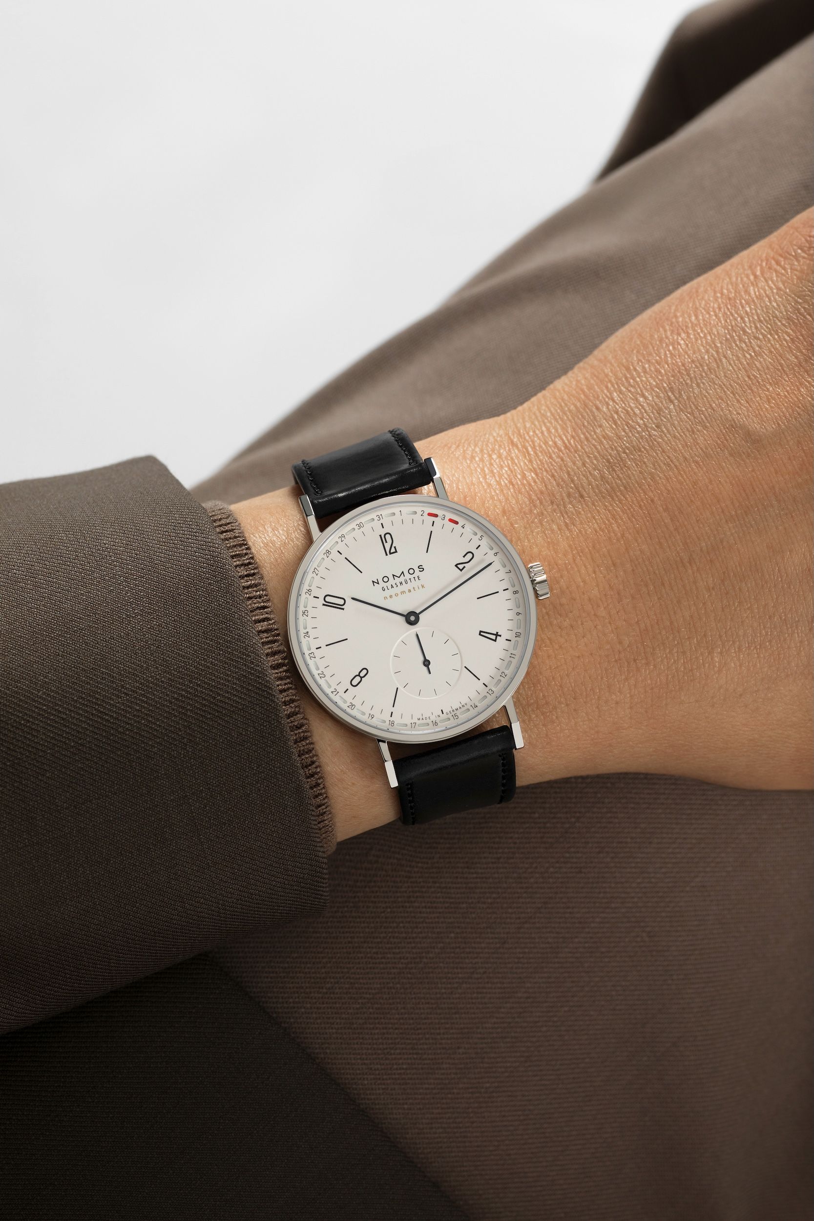 NOMOS Tangente Neomatik 38 Update ref. 147 on the wrist with black Horween shell cordovan strap