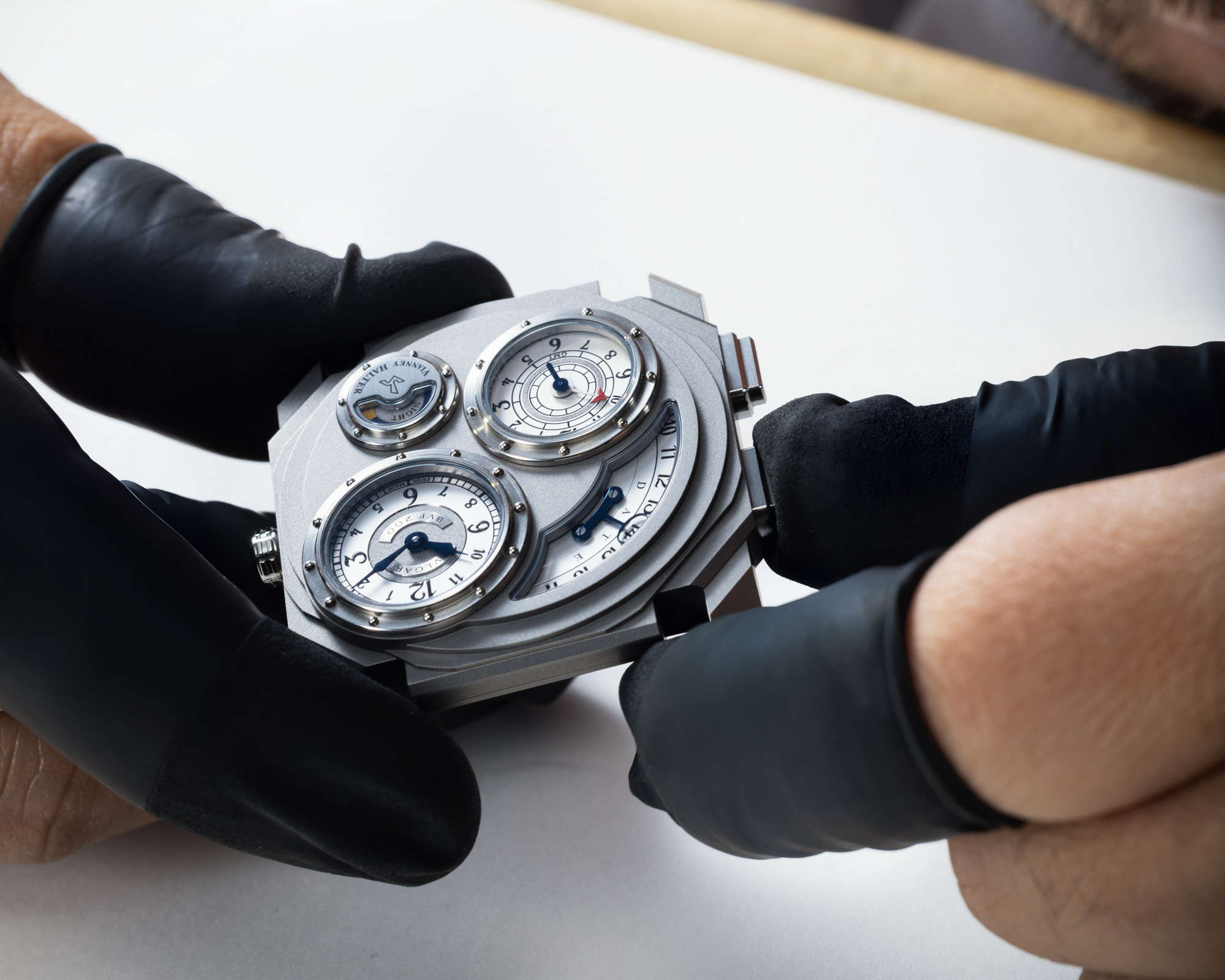 Bulgari Octo Finissimo Dual Time x Vianney Halter titanium case and integrated bracelet studio shot