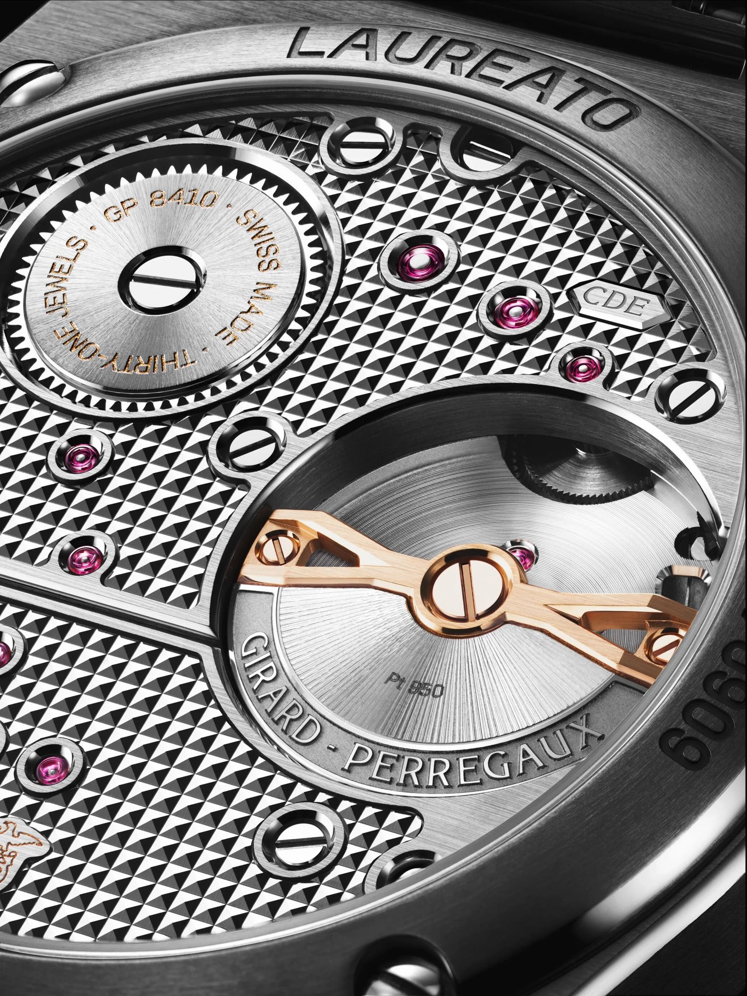 Sapphire caseback revealing the in-house calibre GP8410 with platinum and pink gold micro-rotor in the Girard-Perregaux Laureato Fifty Tourbillon