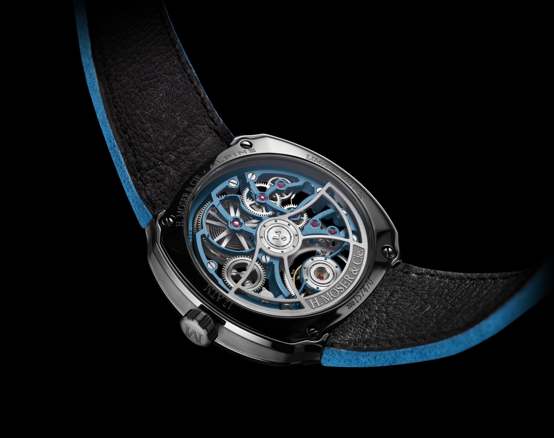 H. Moser Calibre HMC 814 skeletonized movement view through sapphire caseback showing gold rotor