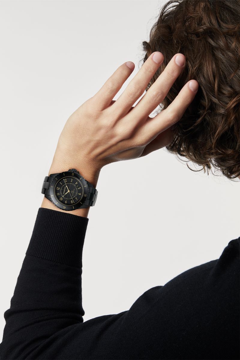 Chanel J12 Golden Black Caliber 12.1 42mm worn on the wrist with its black ceramic three-link bracelet