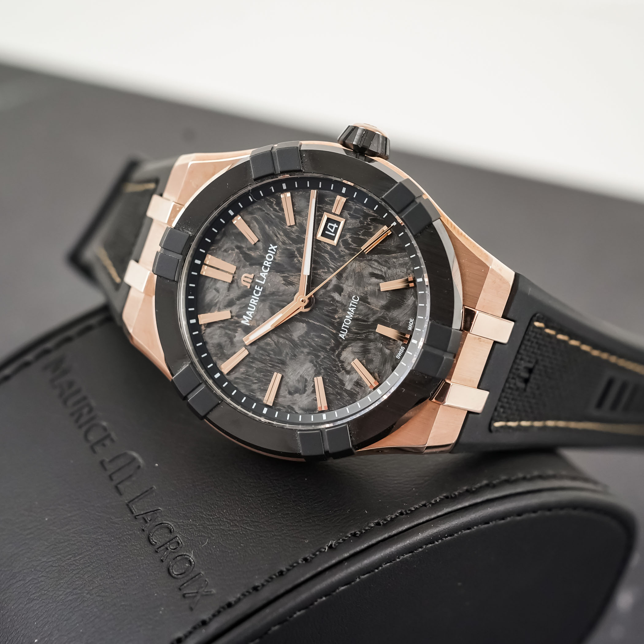 Sapphire caseback displaying the Calibre ML1000 automatic movement with Côtes de Genève finishing