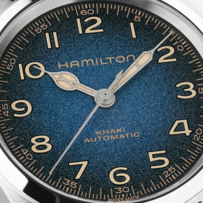Close-up dial detail of the Hamilton Murph 38mm with comet blue-to-black grained dial and cathedral hands