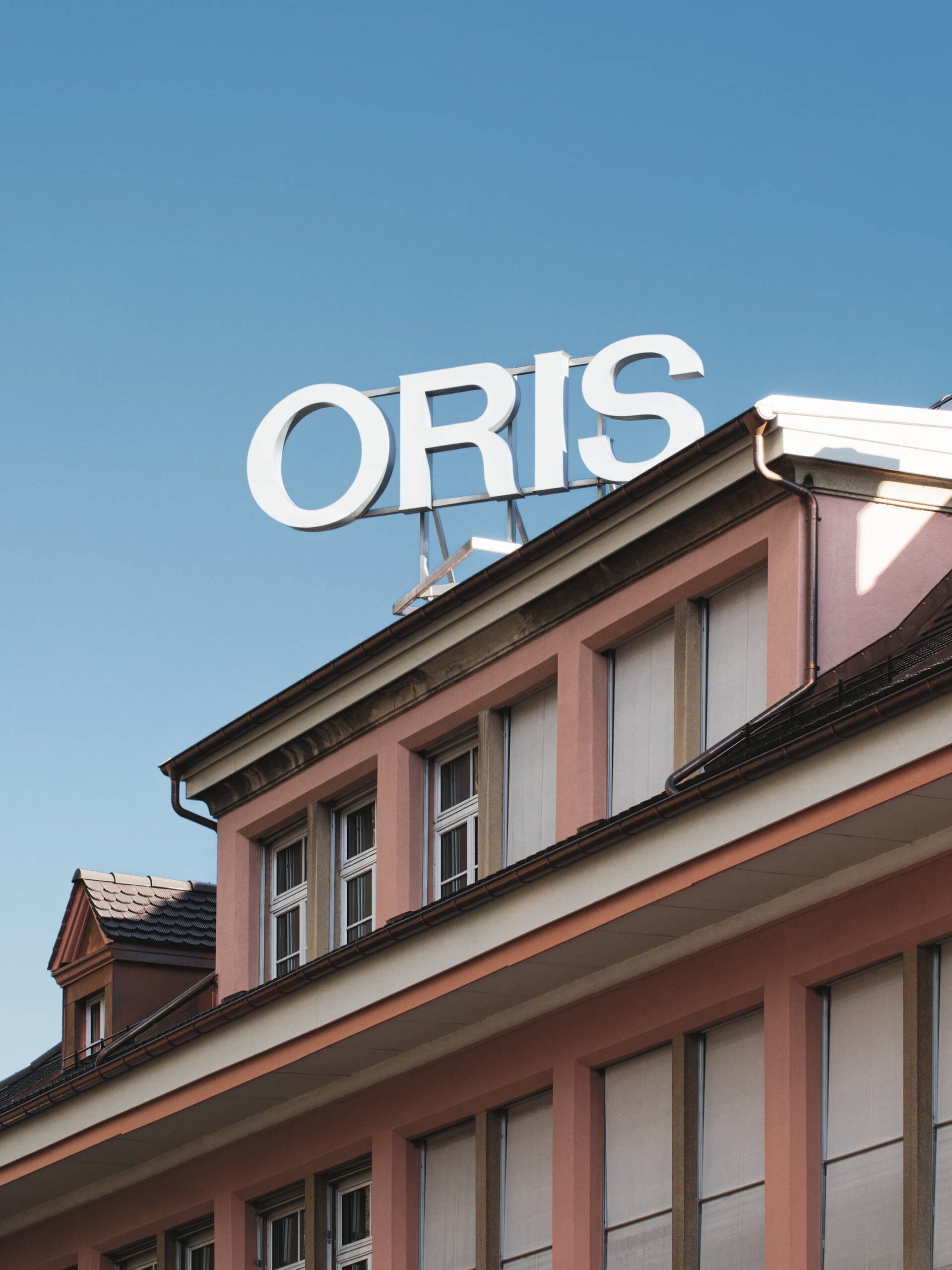Historic photograph of the Oris factory building in Holstein, Switzerland
