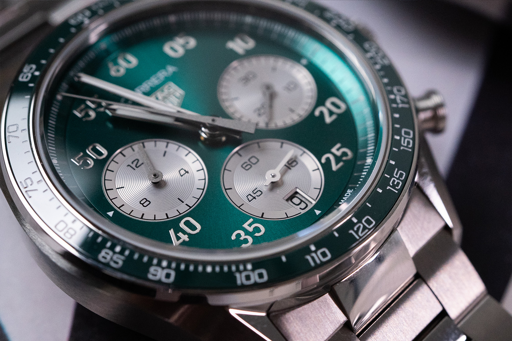 Case profile of the TAG Heuer Carrera Chronograph Sport 2026 showing piston pushers and inwardly-faceted lugs