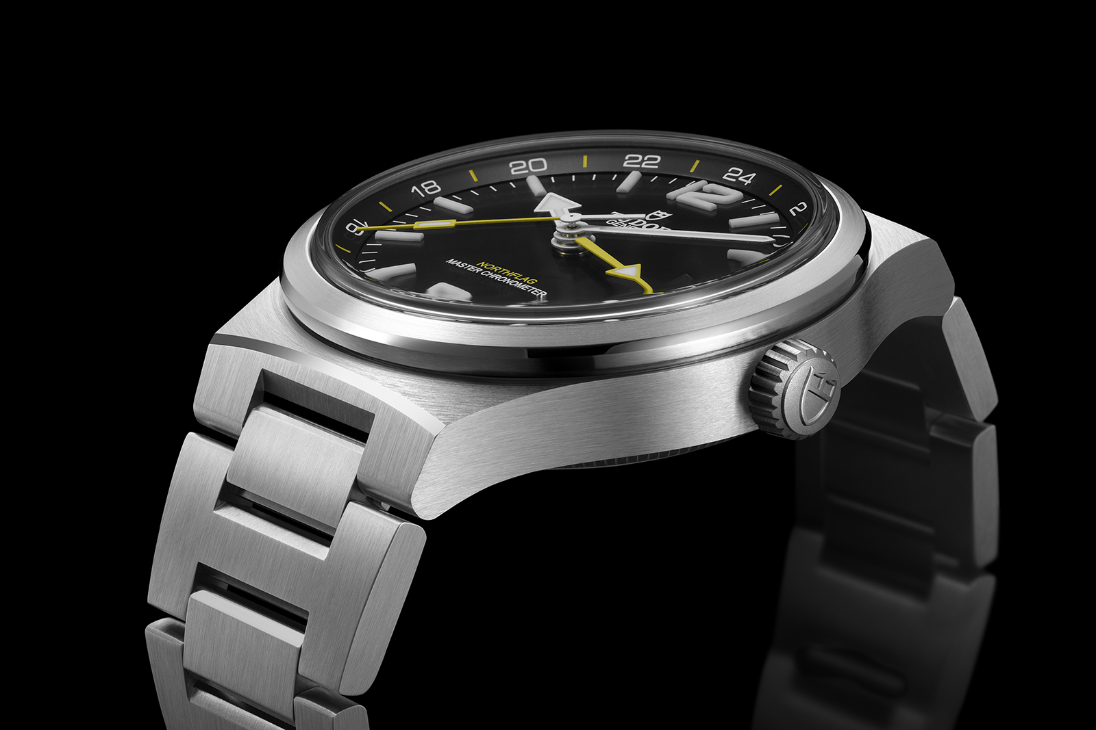 Tudor Northflag GMT case profile showing chamfered edges, fixed brushed bezel and domed sapphire crystal